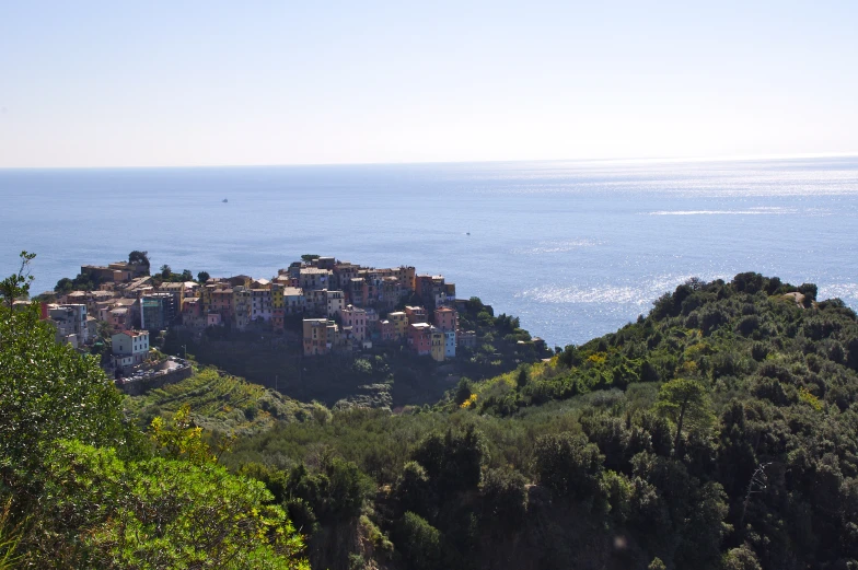 an overview image of a city perched on the side of a hill