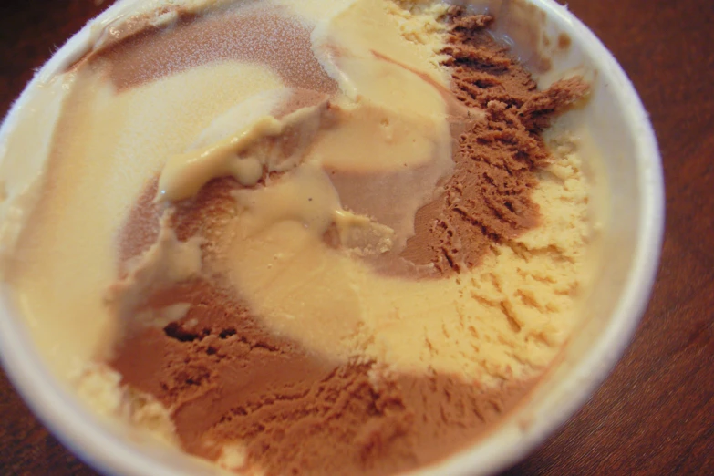 a bowl with a chocolate dessert inside it