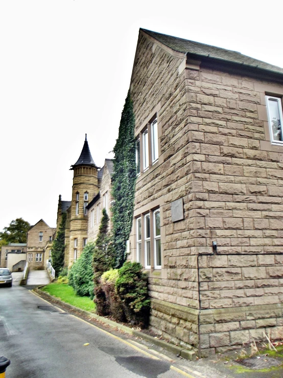 a house with a plant growing on the front of it