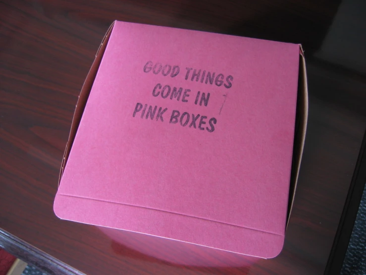 a pink box with some type of advertit on it
