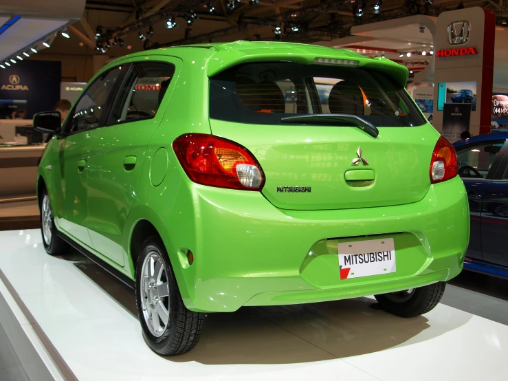 a bright green car with two different colors of the car