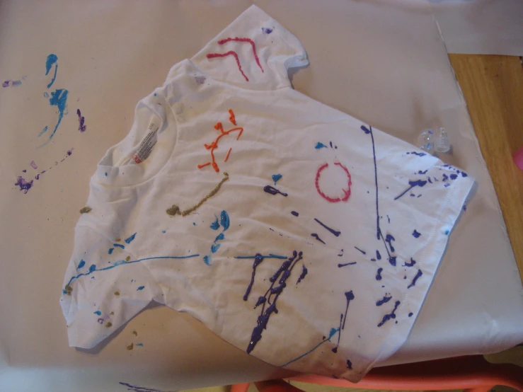 an old shirt that has been splattered with paint