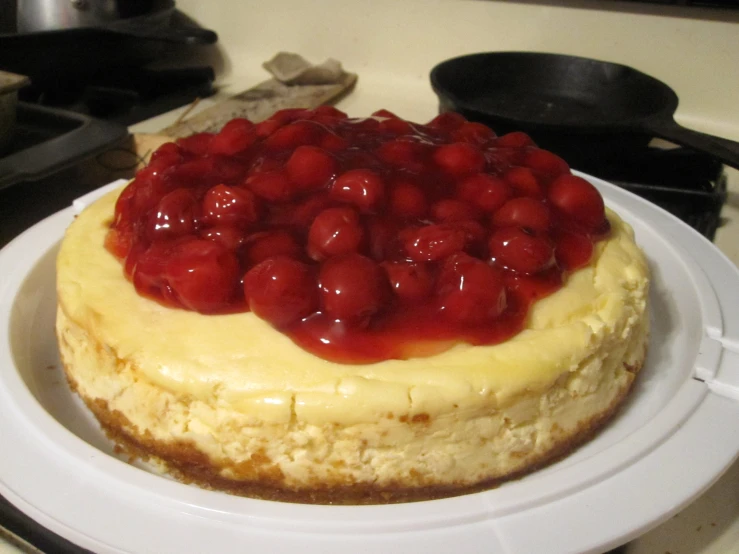 there is a very large dessert on the stove