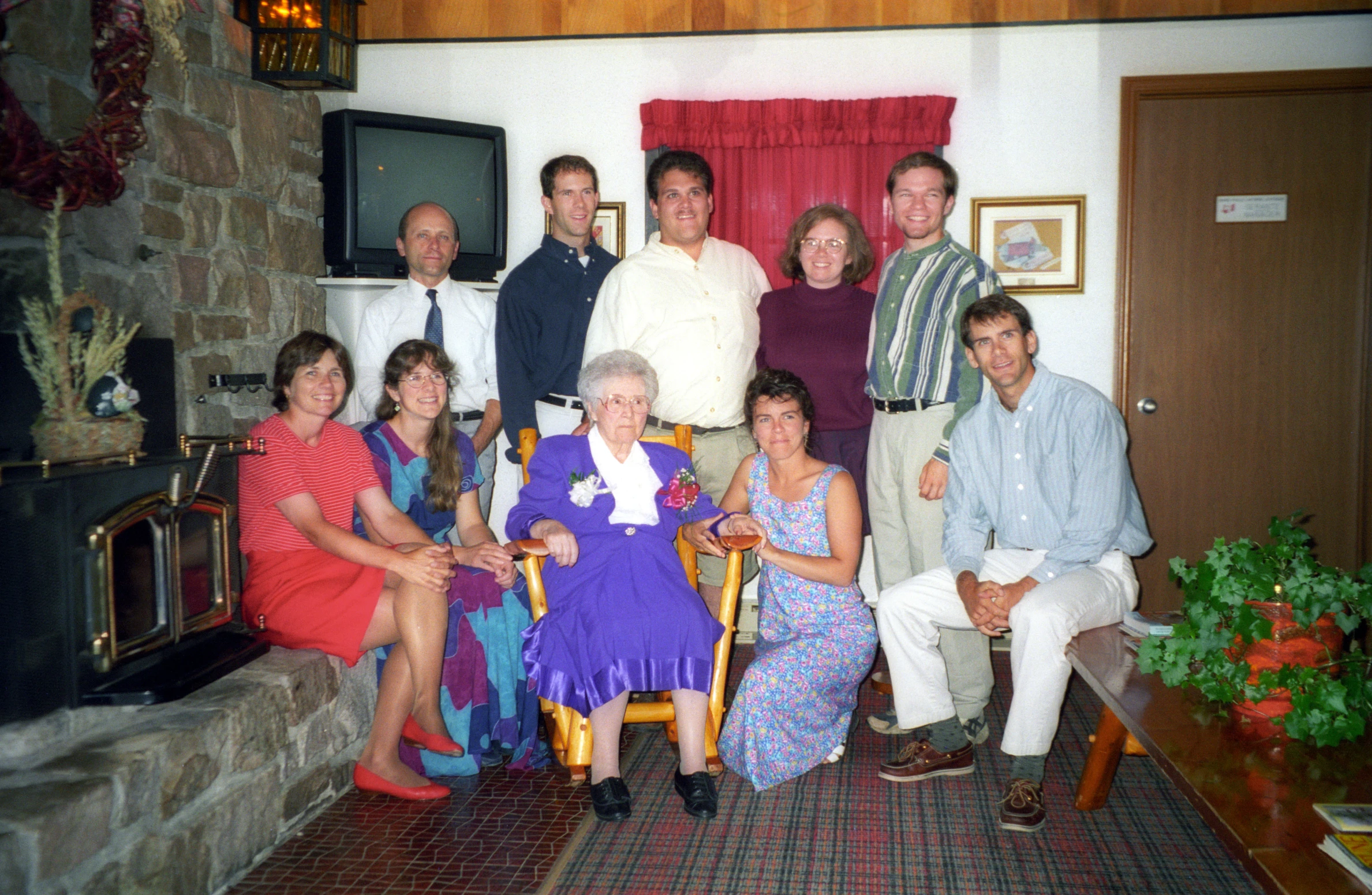 a group of people that are sitting down in a room