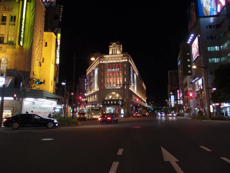 the view down the street in the city at night