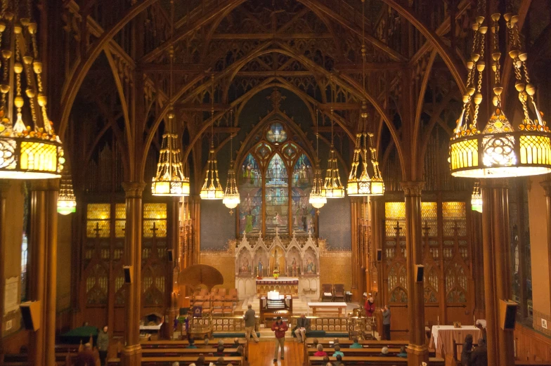 the interior of a church that is covered in light