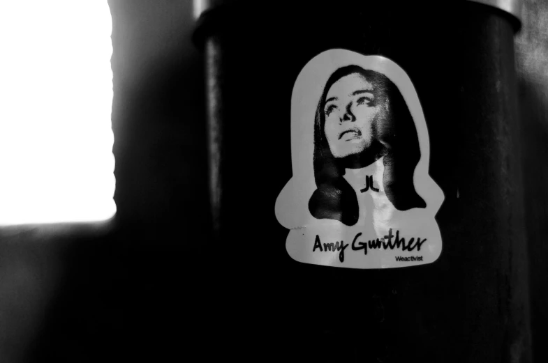 a black and white po of a sticker of a political figure