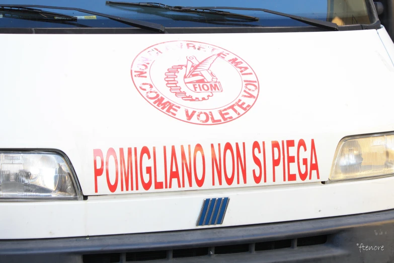 the front grille and decals of a police vehicle