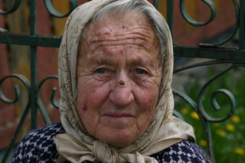 the older woman has a scarf on her head