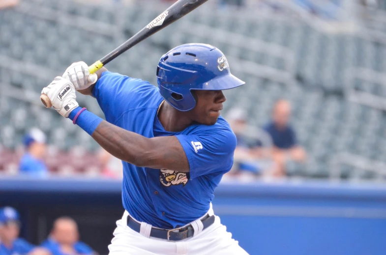 a baseball player getting ready to swing the bat