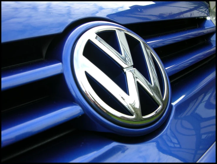 close up of the emblem on a vw car