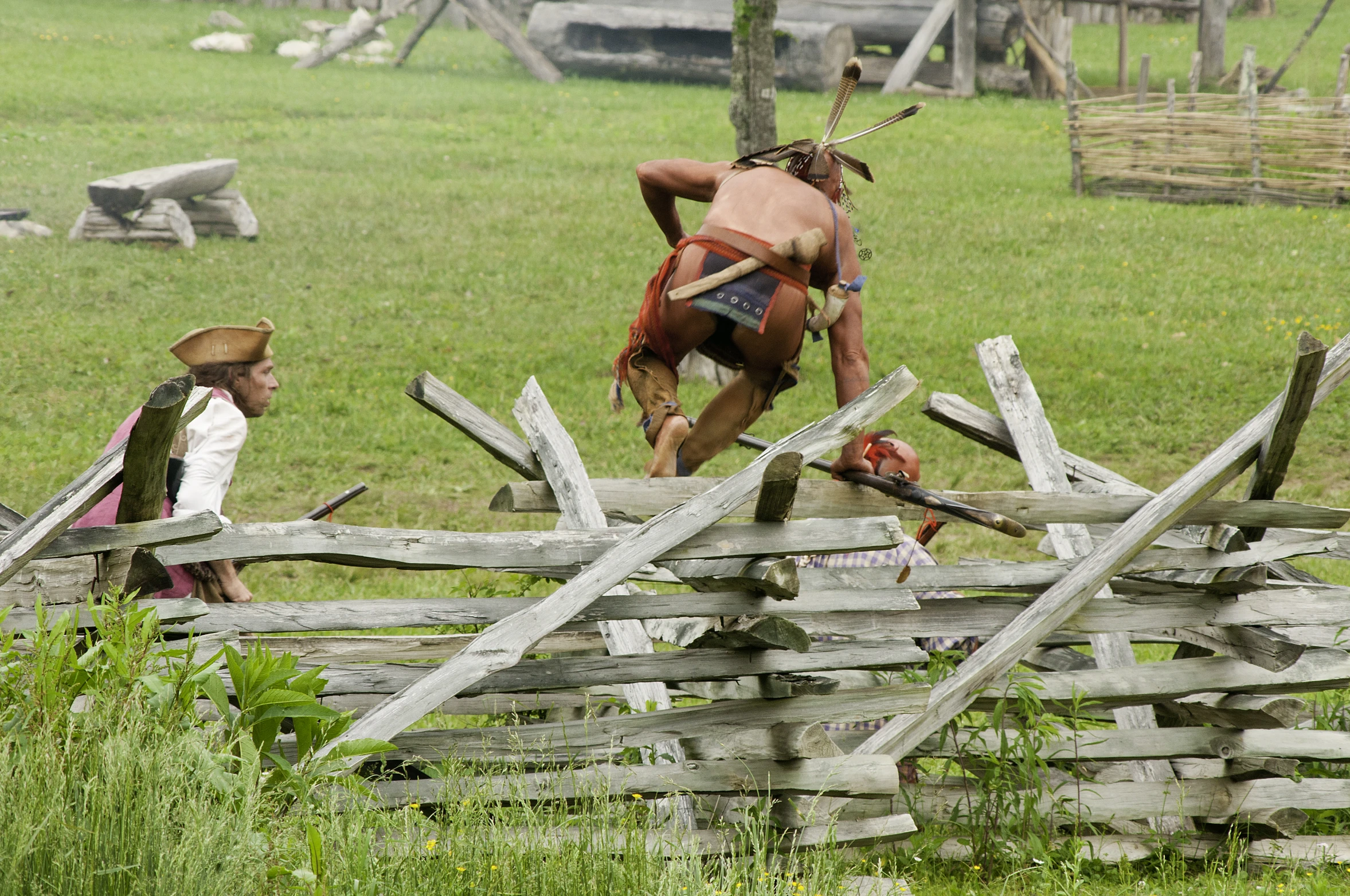 a man riding on the back of a brown horse