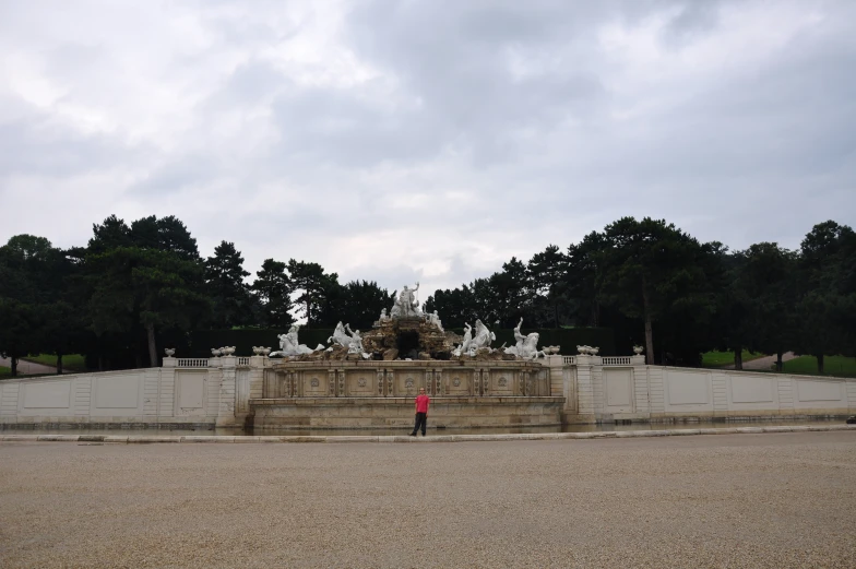 the large square is empty and the person stands alone