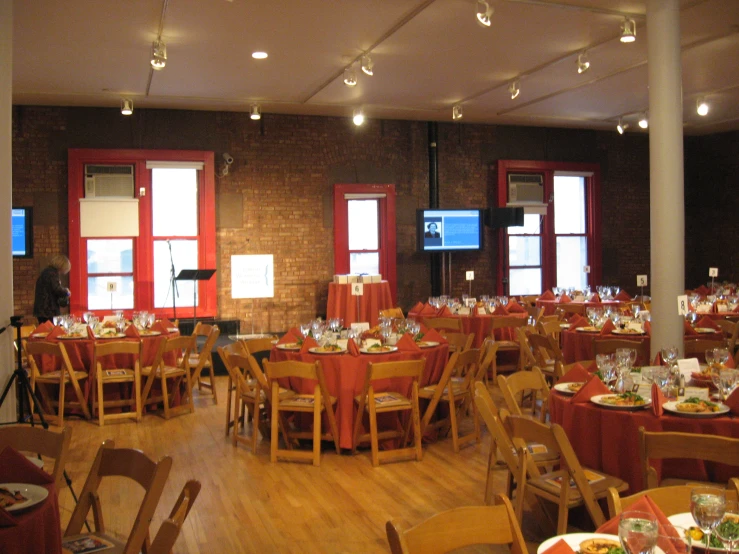 the function room is full of many types of chairs