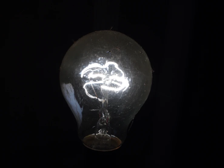 a glowing bulb with a drawing on it