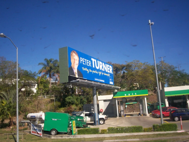 a billboard advertises the movie peta thunder