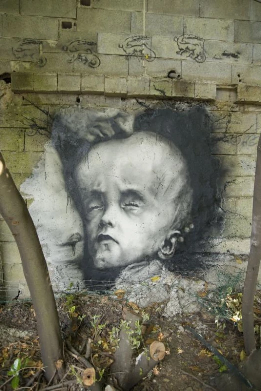 this is a graffiti drawing of a baby's head