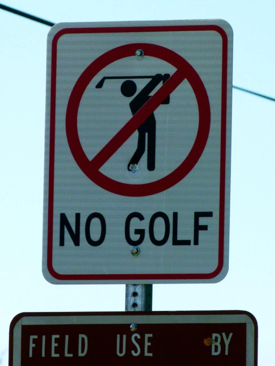 two street signs mounted on a metal pole