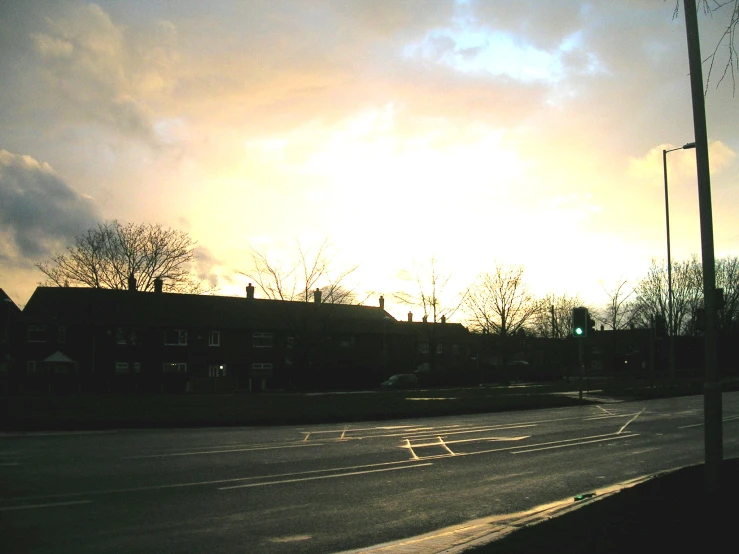 a road with a sky in the background