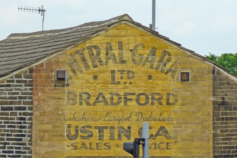 a yellow brick building that reads rural club up dford