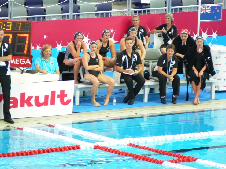 the competitors of the swim team posing for a group po