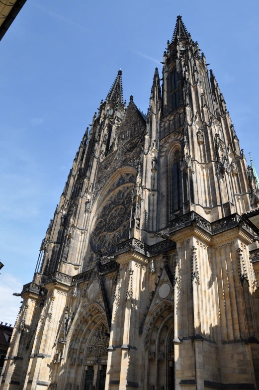 a large cathedral has intricate carvings on its side