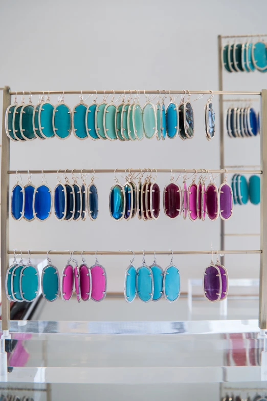 a display case holds a number of earrings