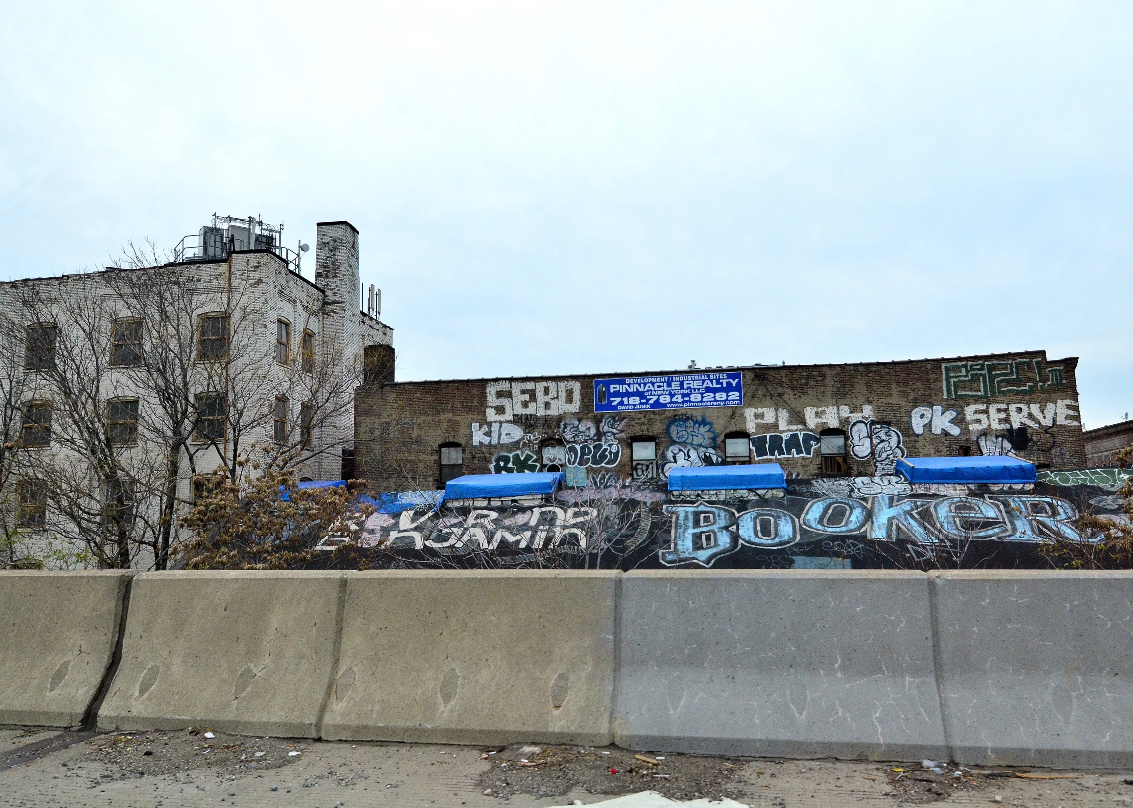 some graffiti on the side of an abandoned building