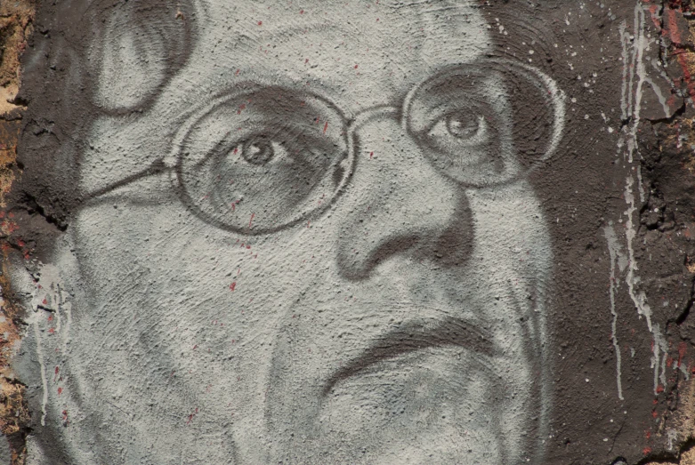 an old po of a man with glasses painted on it