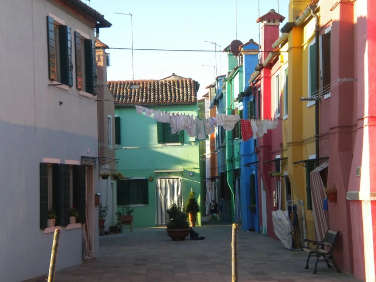 colorful alley of buildings lining the entire street