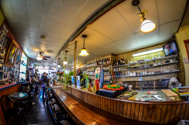 inside a restaurant with tables and chairs