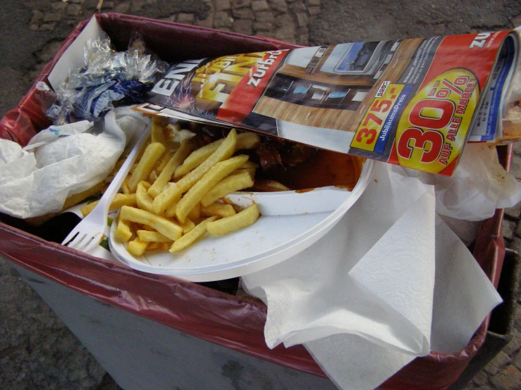 a basket full of food sitting on a ground