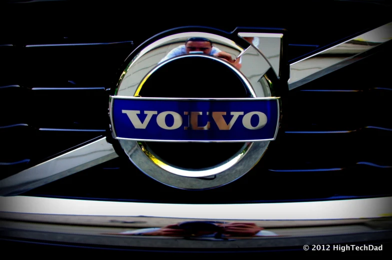 a volvo logo that is on the front of a car