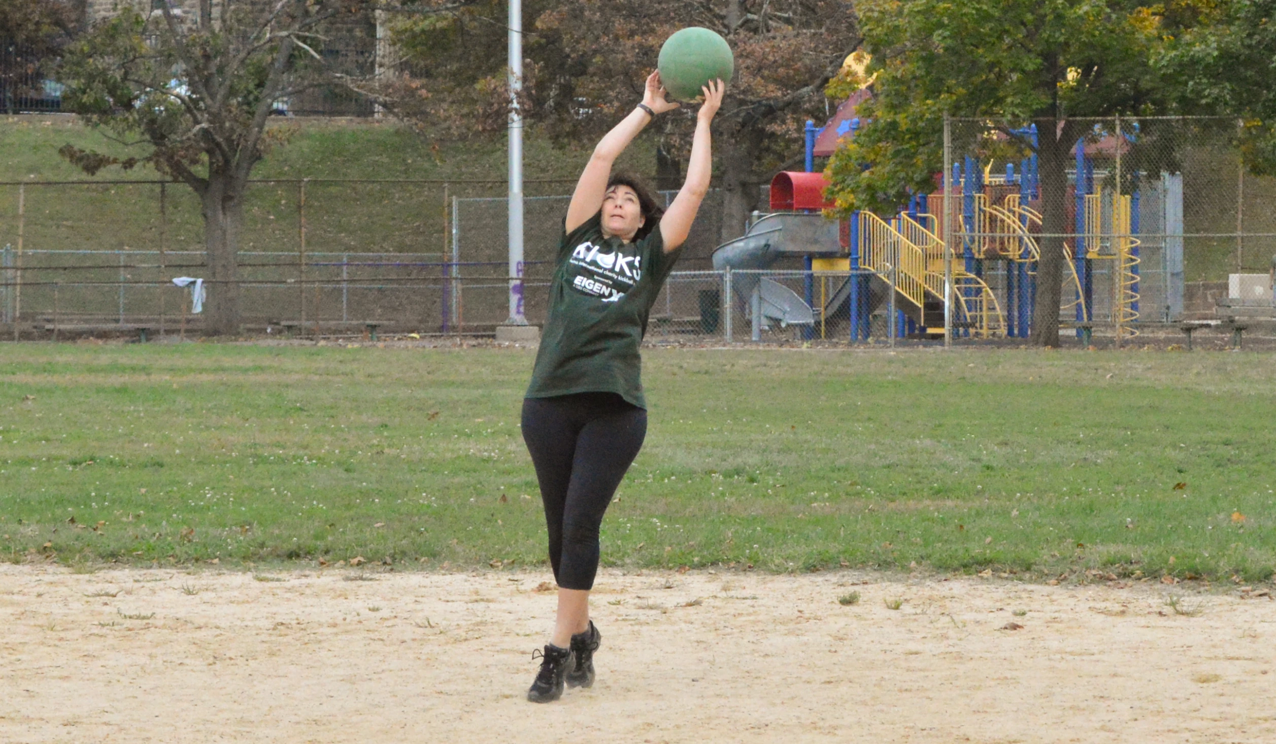 the  is playing baseball in the field