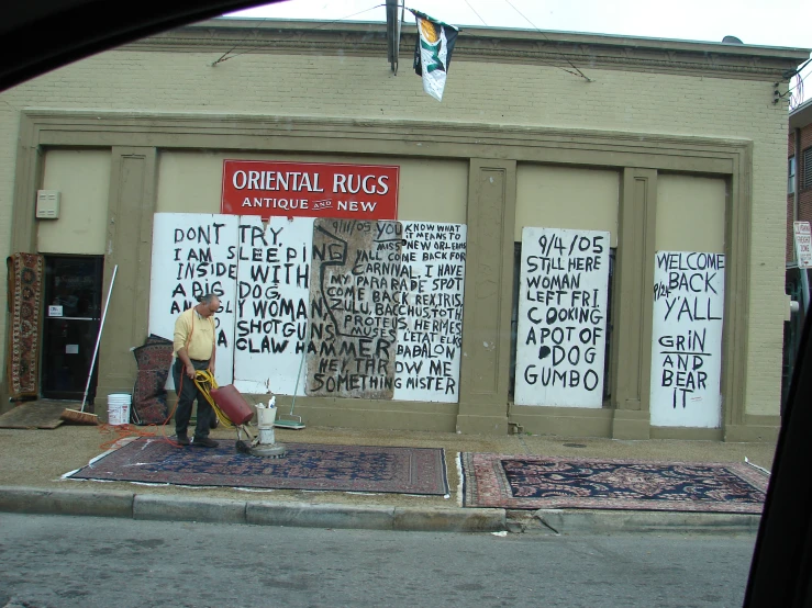 a shop with various kinds of signs on the front