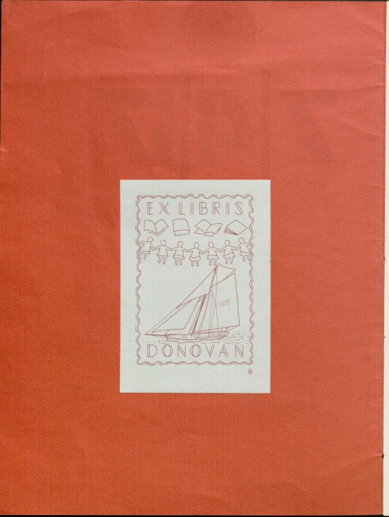 a small drawing of a sail boat on red paper