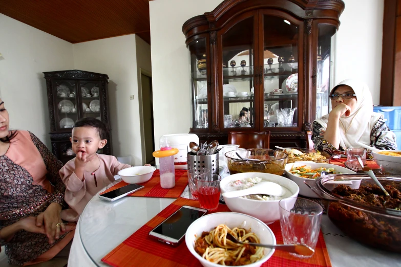 family eating dinner at home on kitchen table