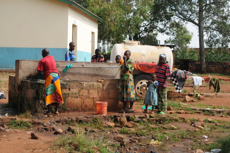 people washing in the village while looking in