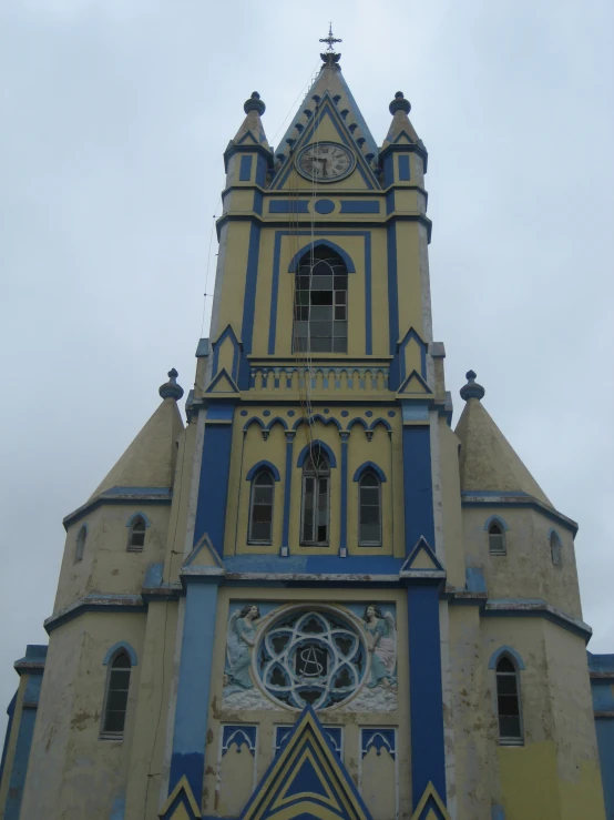 this old church looks very old and has a clock