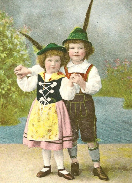 two children dressed in costumes pose for a portrait