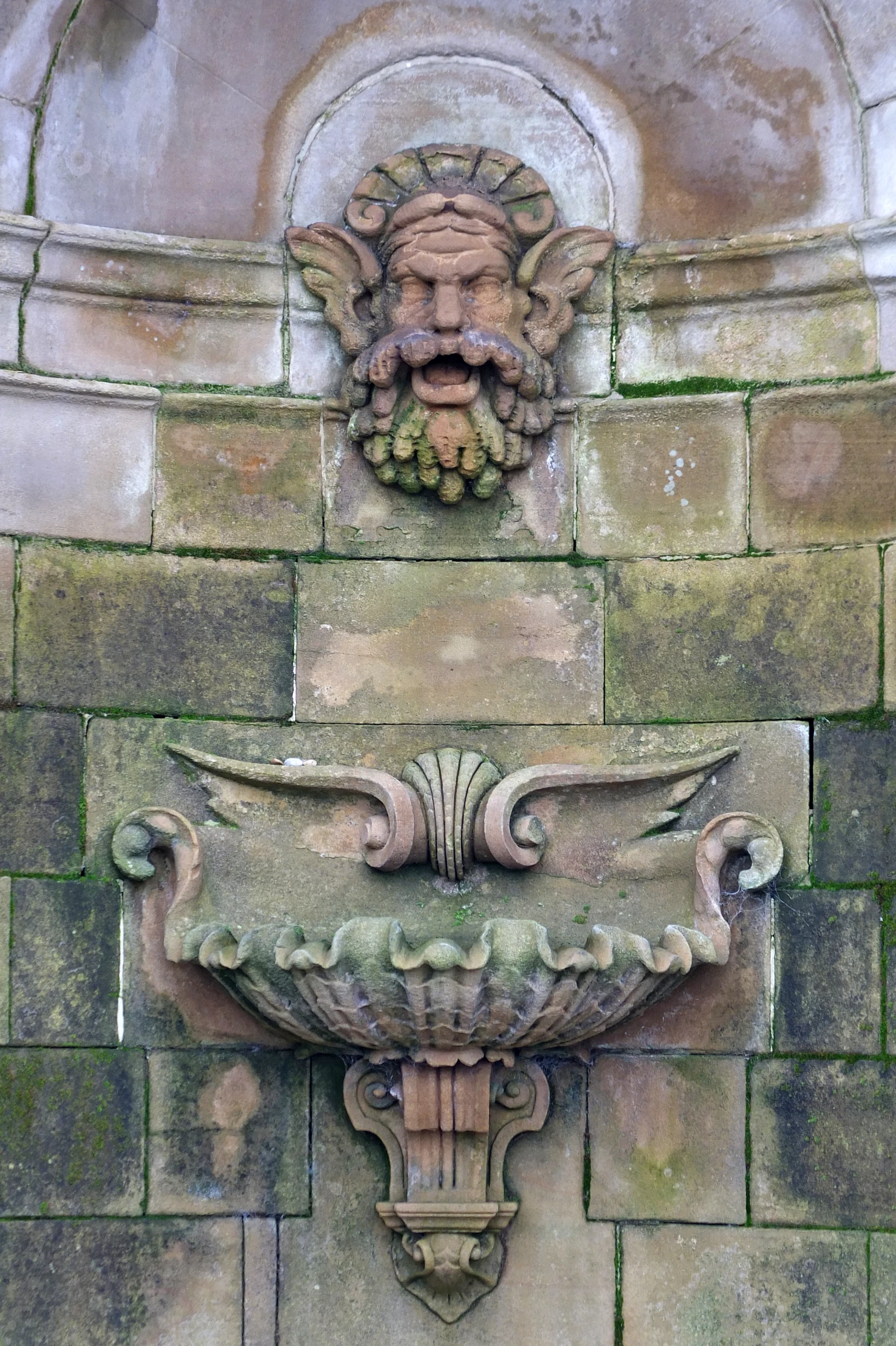 a close up image of a decorative niche on a wall