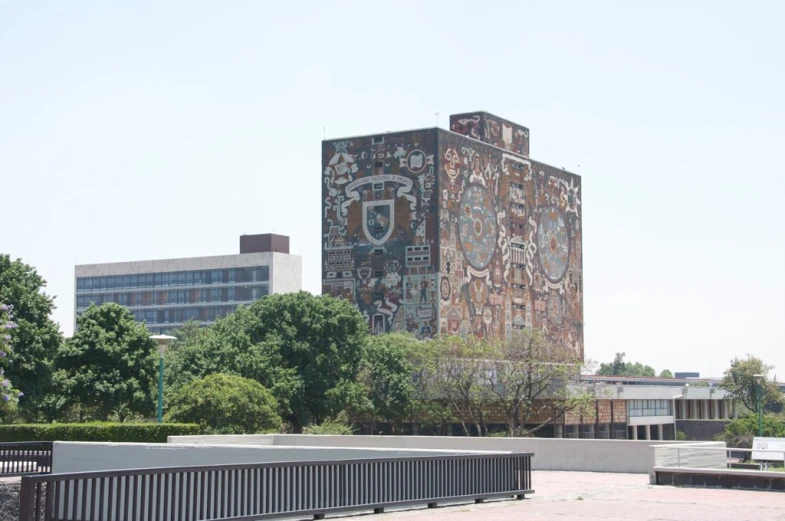 the building with the door on it is near a walkway