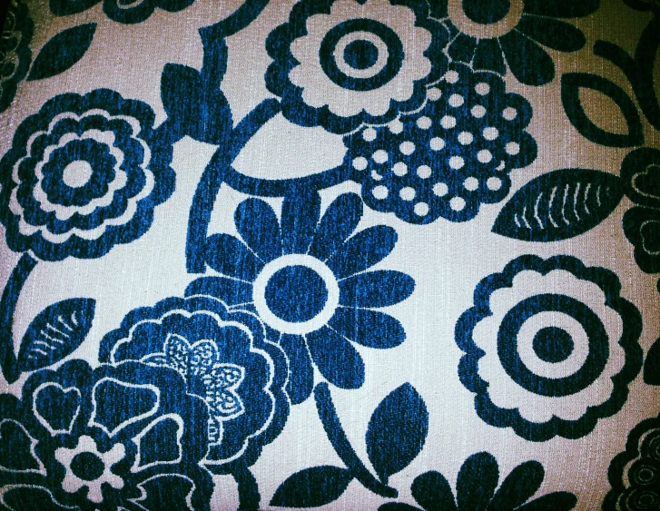 a blue and white floral fabric with large flowers