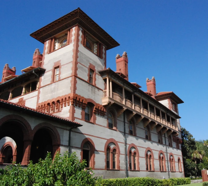 the front of a castle - like building with tall arches