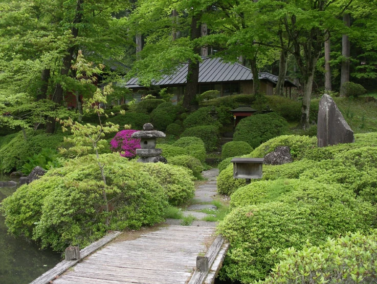 the bridge leading to the garden has a small garden area