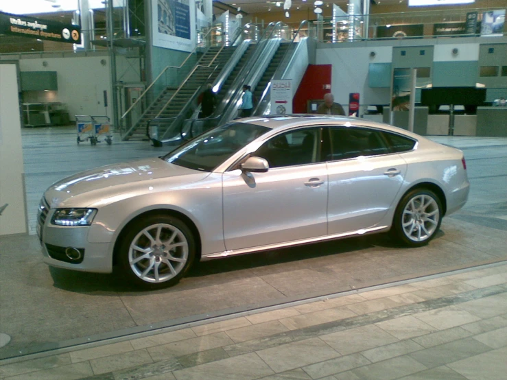 an automobile in a showroom on display