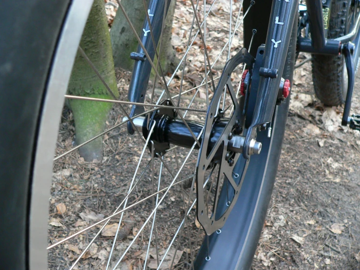 an image of bike front wheel on a trail