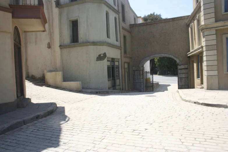 the corner of the street with several buildings on either side