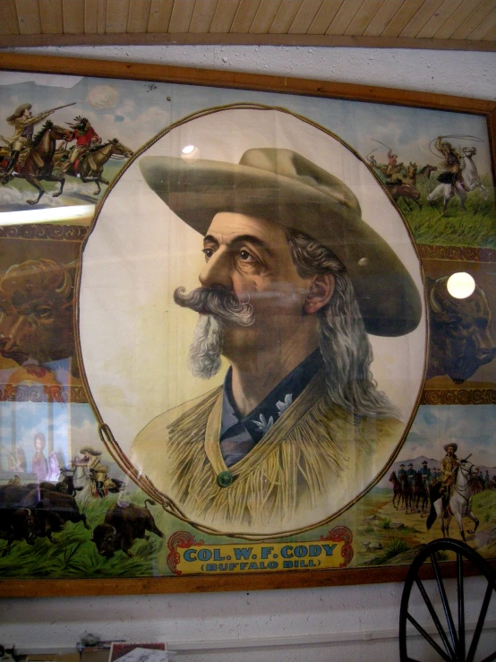 a large portrait hanging from the ceiling of a store