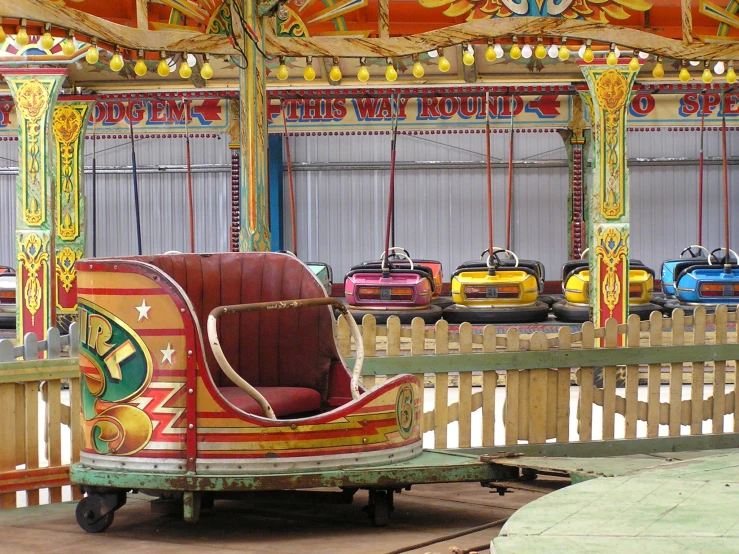 an old fashioned merry - go - round at an amut park